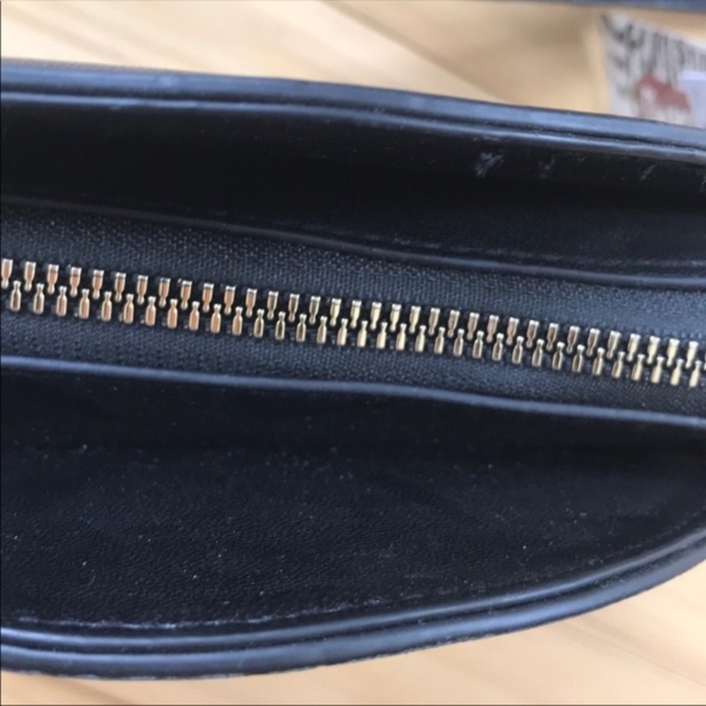 Embossed cross body. - Picture 3 of 3